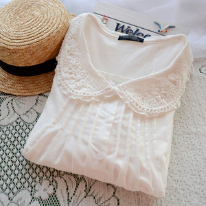 白色棉麻衬衫女娃娃领