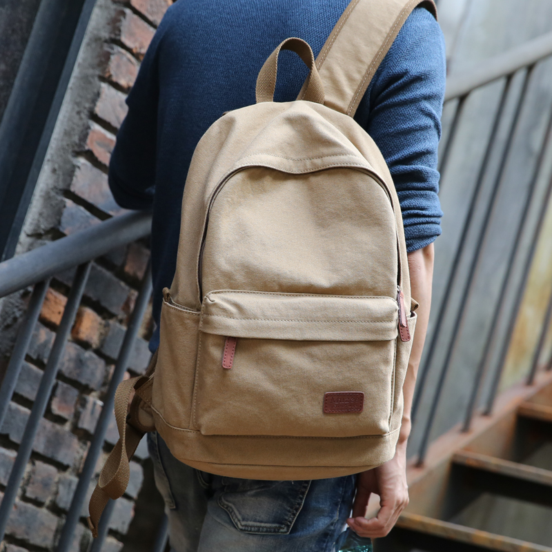 牧之逸时尚潮流双肩包男士休闲帆布背包旅行包高中学生大学生书包