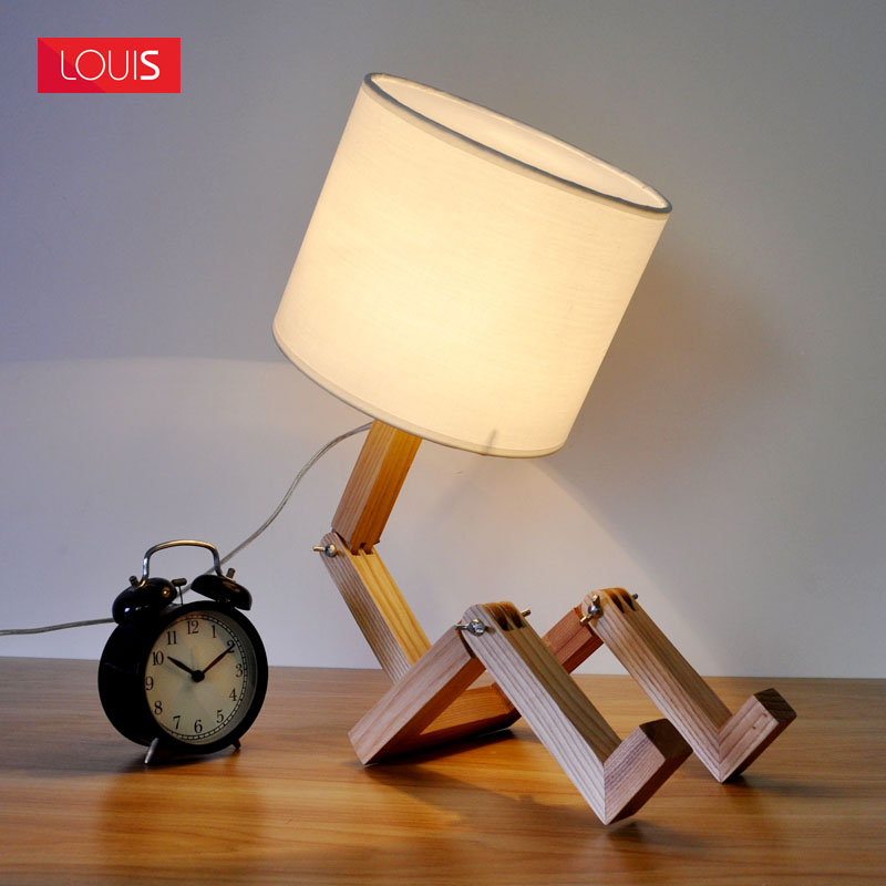 简约jrs视频直播_JRS体育直播_jrs直播是什么意思时尚个性台灯北欧实木质书房咖啡厅装饰机器人可调节台灯